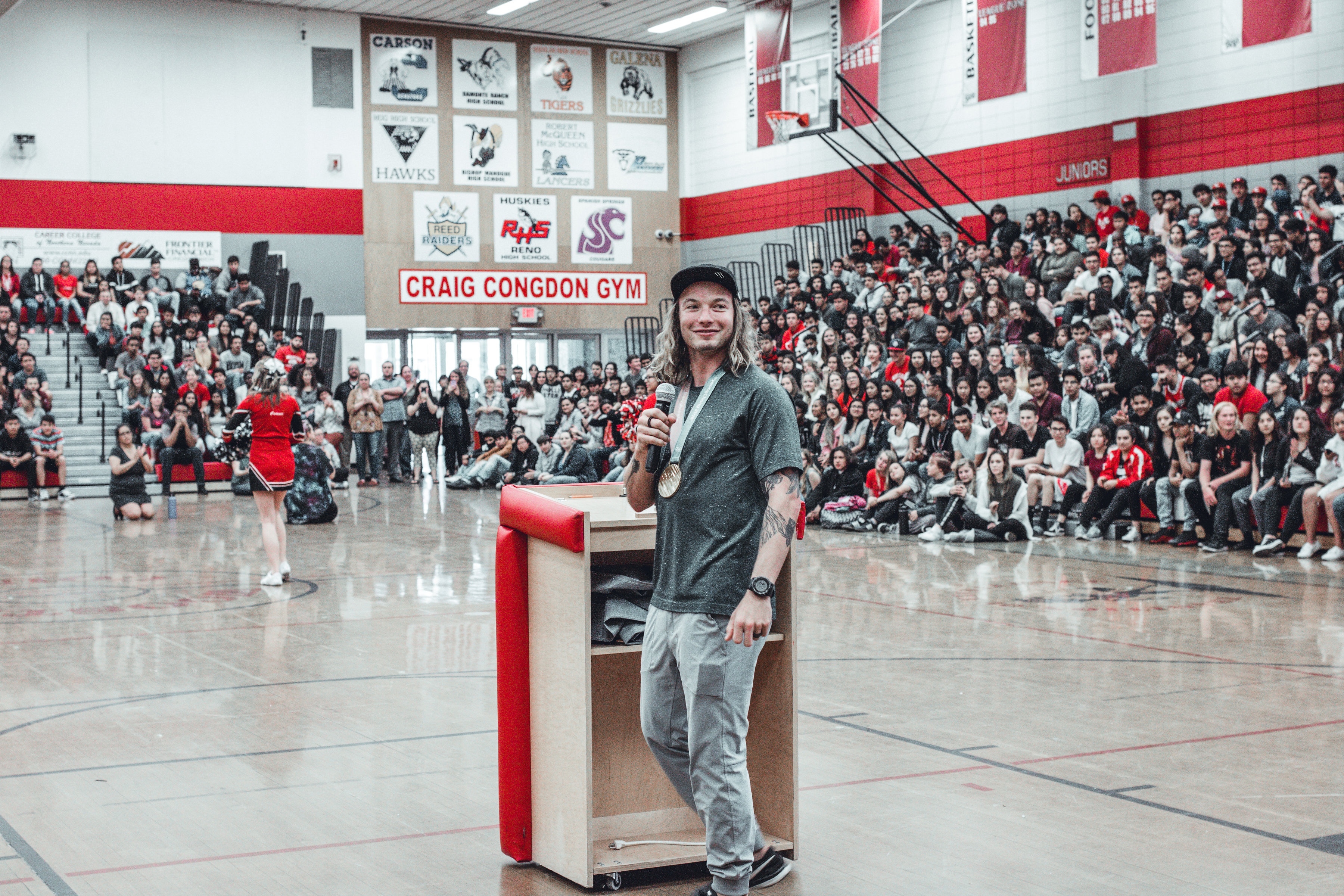 David Wise speaks to a high school assembly